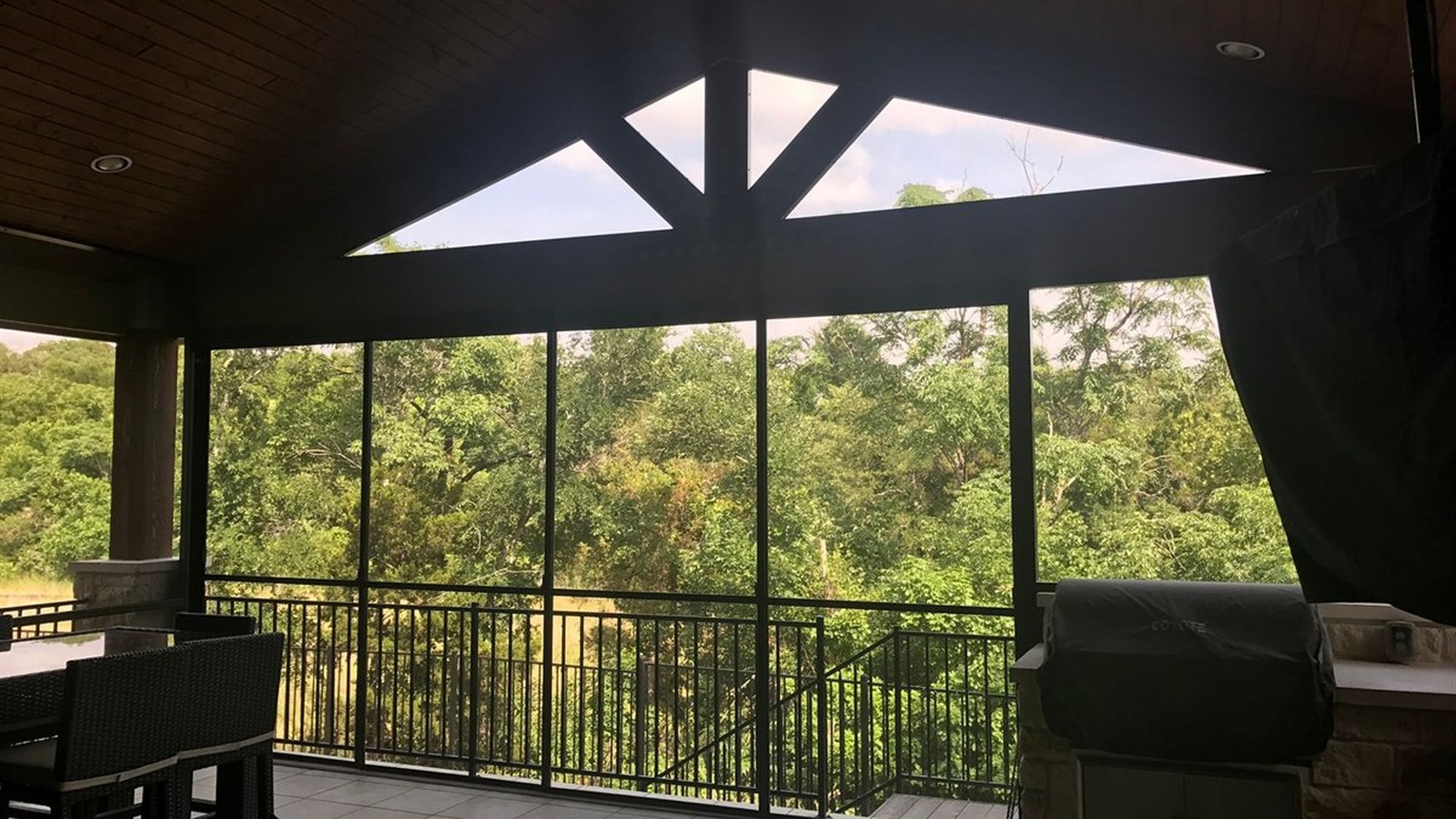 A1 Austin Patio Covers crew finishing an insulated aluminum cover on an Austin home