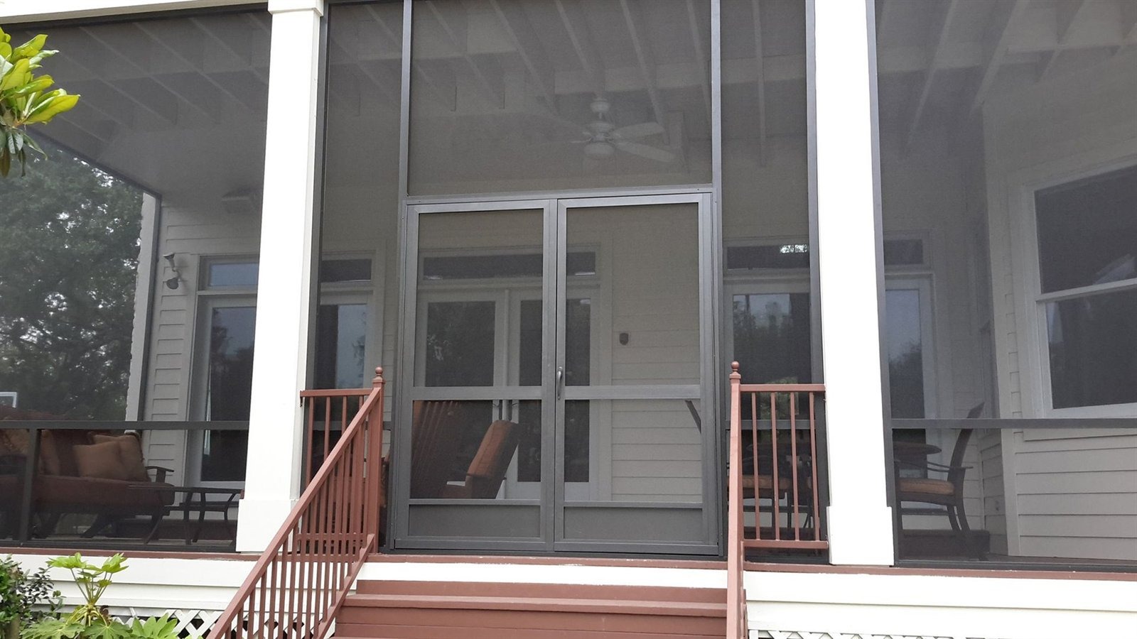 Insulated aluminum patio cover with screens on a single-story Sun City home in Georgetown